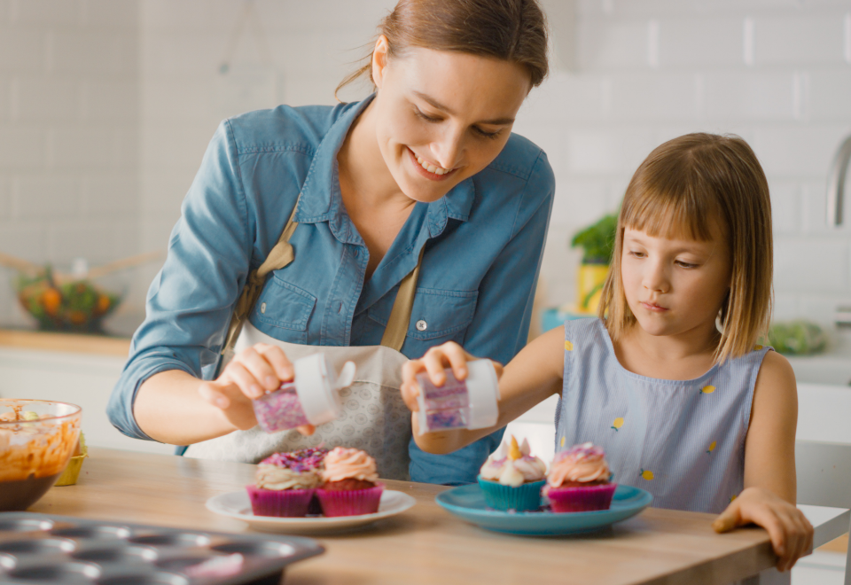 mother and daughter cooking