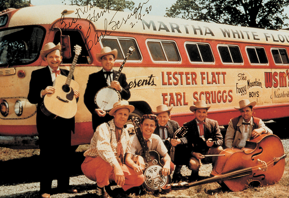 vintage image of the flour peddlers on tour with a bus