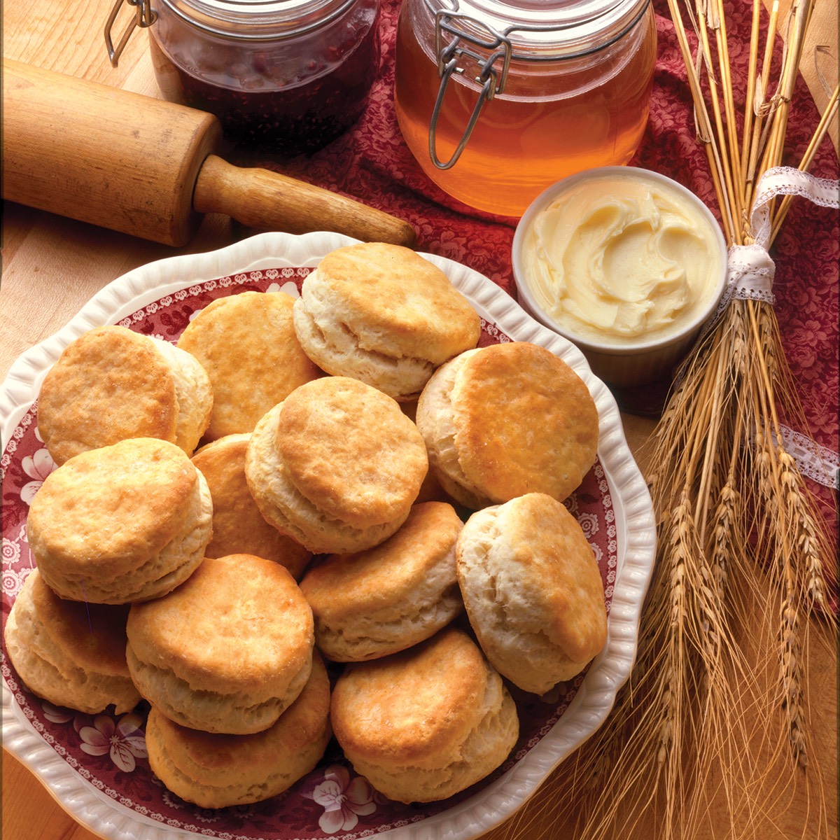 biscuits on a plate with butter and jam
